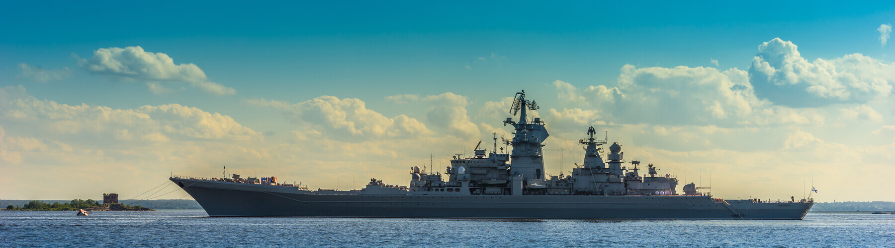 United States Naval ship on the horizon