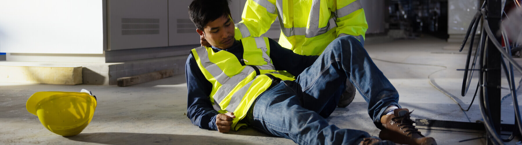 A man hurt on the job and is on the ground
