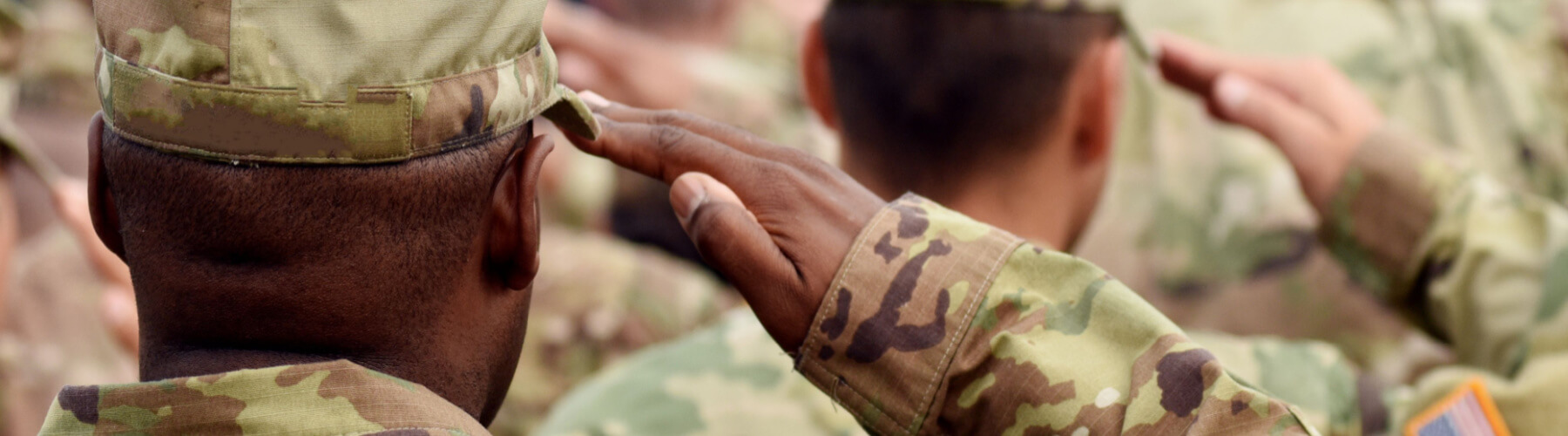 service members saluting