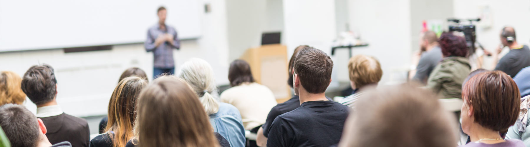 Speaker in a university lecture hall