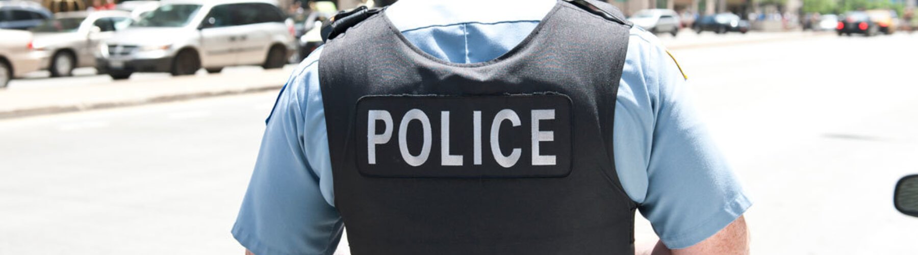 Police officer wearing bulletproof vest