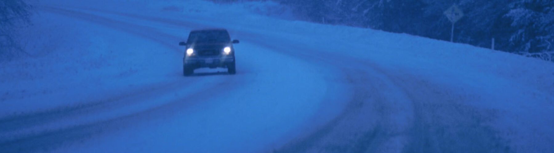 Car in blizzard