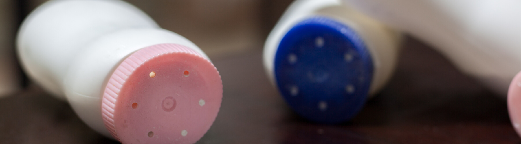 baby powder bottles on their side