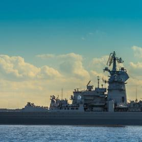 United States Naval ship on the horizon