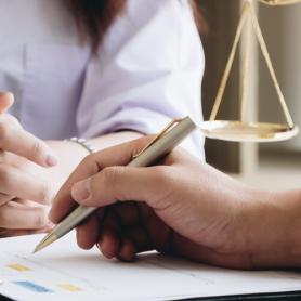 lawyer and client discussing a lawsuit or legal matters