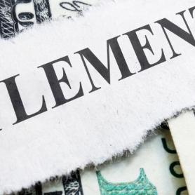 cutout of word Settlement on top of money