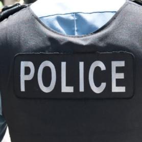 Police officer wearing bulletproof vest