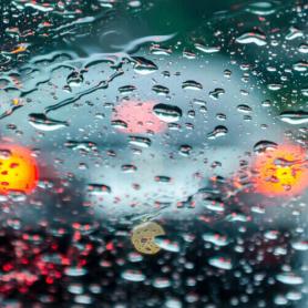 rain droplets obstructing view from windshield